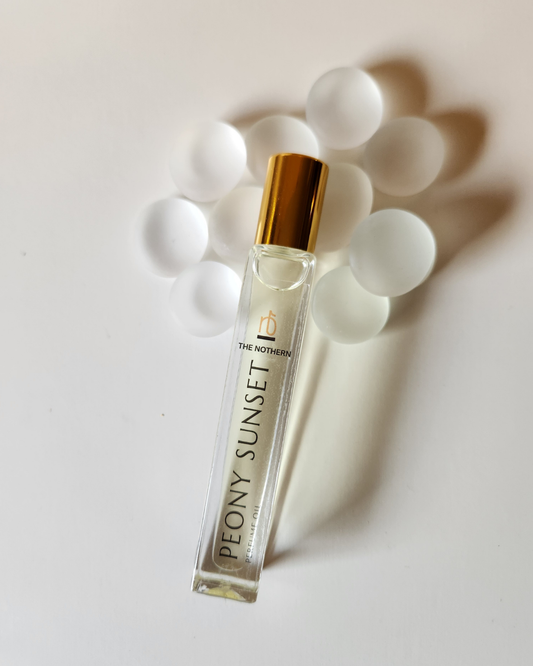 Peony Sundet Perfume Oil -10ml Roller Bottle on white stones  | The Nothern
