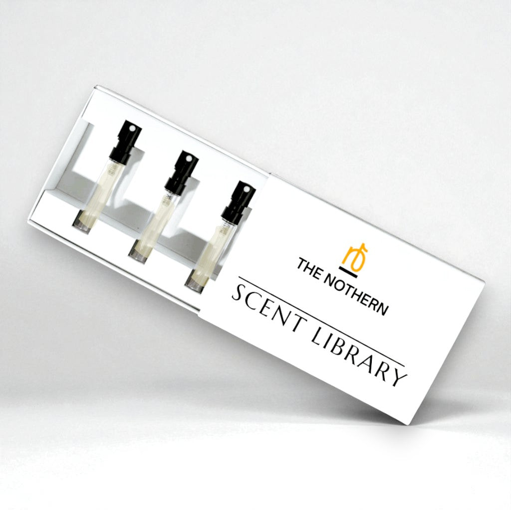 Four perfume bottles in a display case with 'The Northern Scent Library' branding on a white background.
